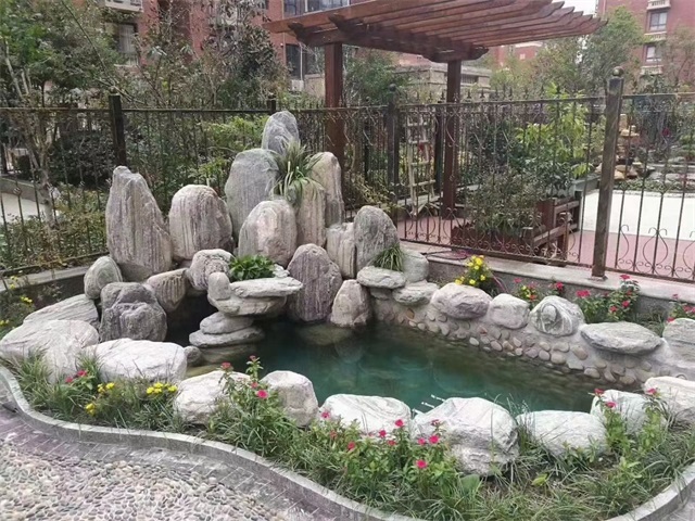 华南热作学院庭院假山鱼池制作视频